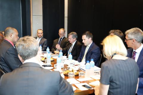 Photo of group discussion with the representatives from the PNG Department of National Planning and Monitoring led by the Minister, Hon Sam Basil MP.