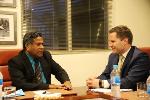 Photo of discussion between the Minister for International Development and the Pacific, the Hon Alex Hawke MP and the PNG Acting Secretary for Health, Dr Paison Dakulala.